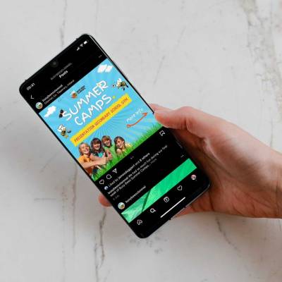 Busy bees Instagram post mock-up on phone in hand